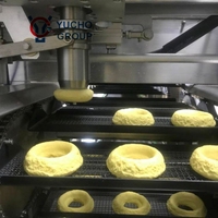 Ligne de production de machines à beignets/donuts entièrement automatiques industrielles Yucho Professional avec acier inoxydable 304 et PLC de marque réputée