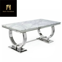 Table à manger de luxe moderne avec plateau en marbre noir et pieds en acier inoxydable doré pour meubles de salle à manger pour maison ou hôtel