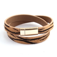 Bracelet en cuir véritable pour femme, style zèbre, fermoir magnétique, bracelet double tour, bracelet en cuir de queue de cheval léopard véritable, vente chaude