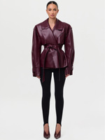 Manteau court en cuir PU haut de gamme pour femme, à taille ajustable, avec grand col à revers, design élégant et ceinture intégrée, idéal pour le printemps