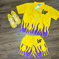 Ensemble deux pièces streetwear pour homme : veste coupe-vent en nylon, chemise et short avec logo brodé flamme – Tenue d'été personnalisée