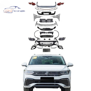 Kits de carrocería antiguos a nuevos para <span class=keywords><strong>VW</strong></span> <span class=keywords><strong>Tiguan</strong></span> Upgrade <span class=keywords><strong>2023</strong></span> <span class=keywords><strong>R</strong></span>-<span class=keywords><strong>line</strong></span> Conjunto de parachoques delantero de coche guardabarros parachoques de coche faros <span class=keywords><strong>Tiguan</strong></span> - Product Image 1