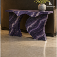 Table console contemporaine sur mesure en marbre de jade violet, modèle Wave Gate, pour projets hôteliers, villas et salons.
