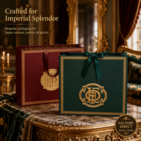 Sacs cadeaux en papier de luxe avec gaufrage en feuille d'or et nœud en ruban pour l'emballage de bijoux fins et de montres