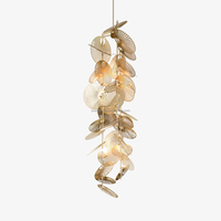 Lustre en aluminium à ventilateur creux empilé verticalement pour grands projets, lampe suspendue d'ingénierie pour escalier en colimaçon d'hôtel de luxe à plafond haut