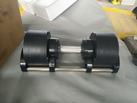 Haltères réglables par incréments de 1 kg et 2 kg, disponibles en kits de 24 kg, 28 kg, 32 kg, 36 kg et 40 kg.