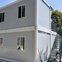 Maison conteneur de luxe détachable de 20 pieds, bureau modulaire préfabriqué en panneaux sandwich, avec salon, chambre et entrée