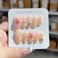 Fait à la main 10 pièces ABS matériel presse-sur faux ongles conception d'amande modèle à la mode personnalisé fleur sculpture doigts