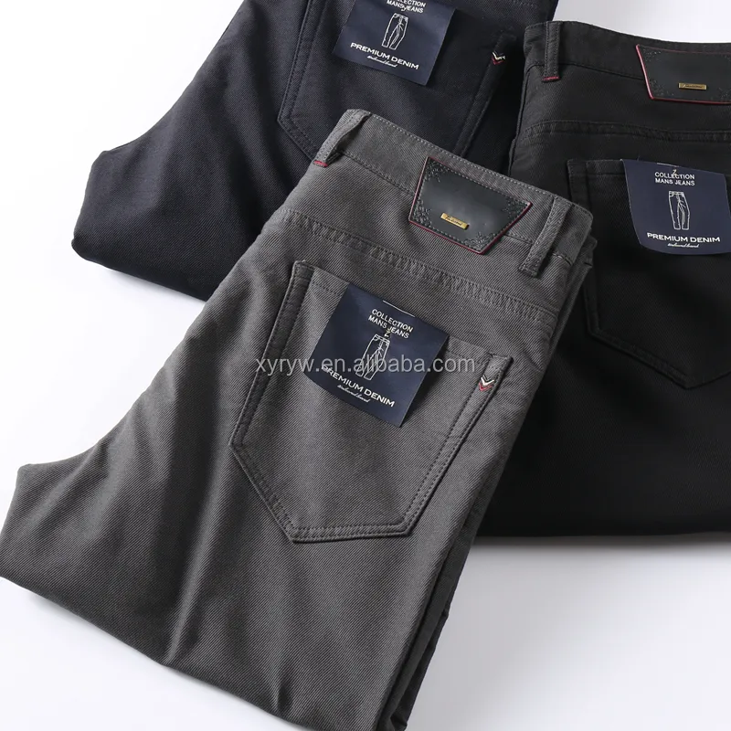 शीतकालीन जींस पैंट प्रयुक्त कपड़े पुरुष जींस क्लास पुरुषों के लिए सेकेंड हैंड कपड़े स्लिम बुना प्रिंट पैटर्न सॉफ़्नर फ़ॉइल प्रिंट