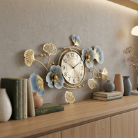 Jam Dinding Besar Modern Mewah Berbahan Logam, Bercahaya, Tanpa Suara, Ukuran 33x19 Inci, Motif Daun Ginkgo, Jarum Biru Emas, Dilengkapi Kalender, untuk Dekorasi Rumah dan Ruang Tamu