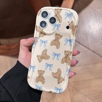 Coque de téléphone motif ours mignon et nœud crème pour iPhone 16 15 14 13 12 17 Pro 18 Pro Max, coque antichoc à bords ondulés, étui arrière