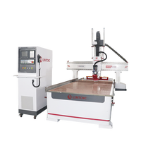 Routeur CNC ATC linéaire 4 axes 2130 de haute qualité pour la sculpture sur bois changeur d'outils automatique bonne qualité 2130 cylindrique