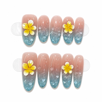 Ongles artificiels de luxe faits main en acrylique à couverture complète, motif nœud et pointe, dégradé bleu nude scintillant, forme ovale avec colle réutilisable