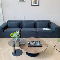 Canapé modulaire sectionnel trois places en mousse haute densité, emballé sous vide, revêtement en tissu velours côtelé noir, idéal pour appartement moderne