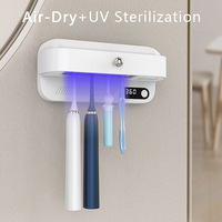 Désinfectant pour brosse à dents familiale rechargeable par USB avec fonction de désinfection sèche et UV par ventilateur à quatre fentes pour brosses à dents