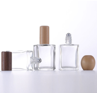 Bouchon en bois rose vert bouteille en verre pour huile essentielle emballage cosmétique Rectangle clair 15ml vide huile parfum bouteille rouleau sur