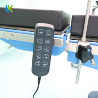 Table d'opération électrique à cinq fonctions, table chirurgicale transparente aux rayons X, capacité de charge de 180 kg, batterie intégrée, hôpital