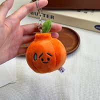 Porte-clés lumineux en peluche citrouille d'horreur, motif circulaire, style simple, doux, réutilisable, en polyester, imprimé en typographie, pour cadeau d'Halloween