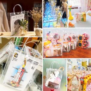 Venta al por mayor personalizado impreso portátil respetuoso con el medio ambiente de vinilo transparente bolsa de <span class=keywords><strong>PVC</strong></span> con asa para dulces Goodie bolsas - Product Image 5