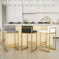 Tabouret de bar contemporain en métal doré Siège rembourré gris Dossier ergonomique Idéal pour îlot de cuisine