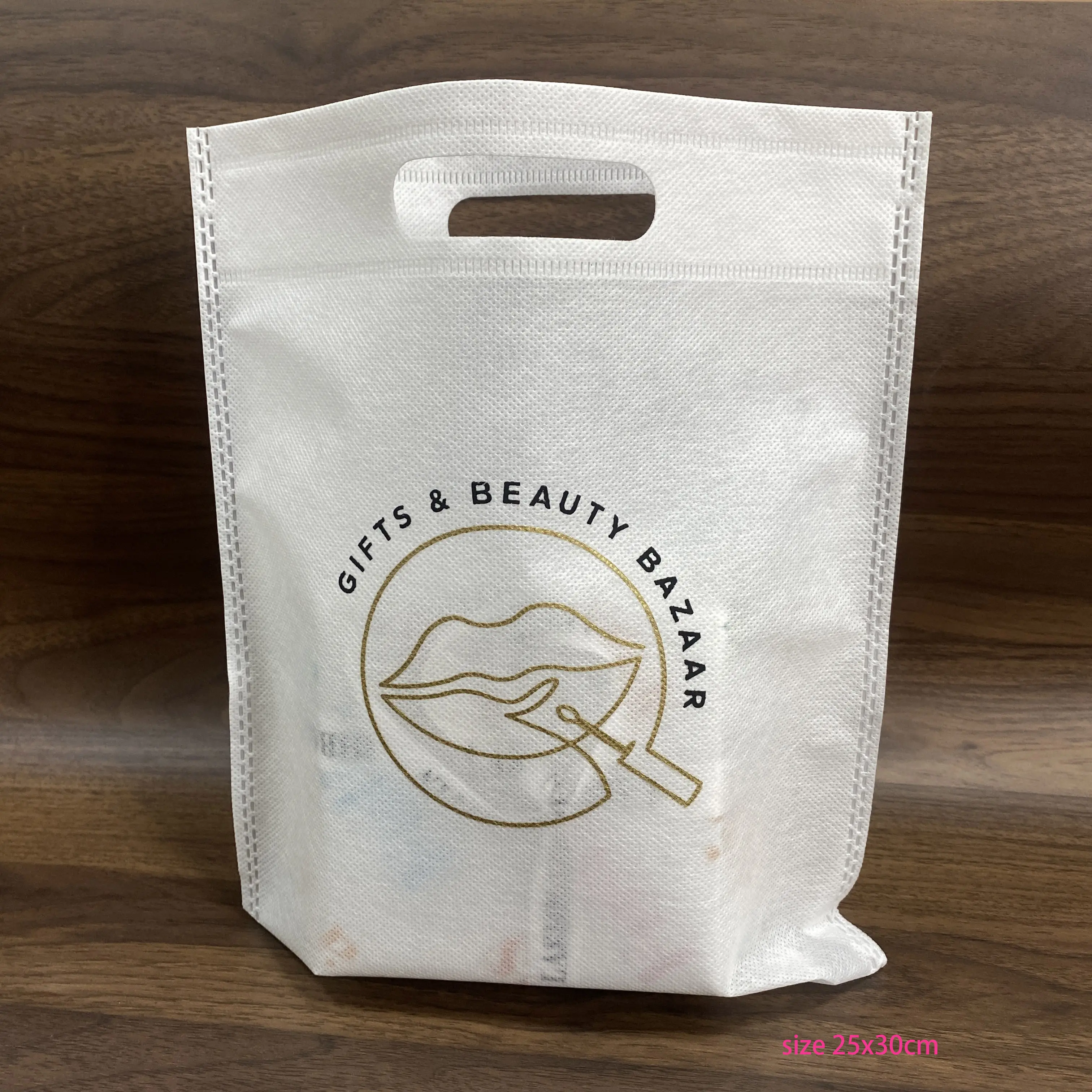 25x30cm Custom logo printed non woven die cut handle carry shopping packaging bags for boutique baby toys