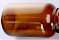 Bouteille de médecine en verre ambré pharmaceutique de 60ml contenant de capsules à large ouverture avec bouchon à vis en aluminium pour perfusion