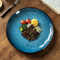 Assiettes en porcelaine bleue écologiques à bords irréguliers, style classique, pour restaurants, traiteurs et vente en gros