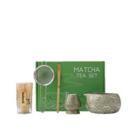 Produit transfrontalier très vendu : Bol à matcha en céramique Dehua de style japonais, motif lotus en relief et fleur de cerisier, fouet à matcha et outil à thé