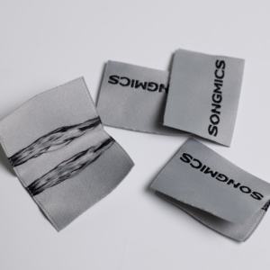 Etiquetas de tela tejida de alta densidad Etiquetas de logotipo personalizado para prendas y uniformes - Product Image 5