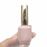 Flacon de vernis à ongles en verre gel personnalisé de luxe de 11 ml, flacon vide unique de couleur rose avec pinceau et bouchon doré