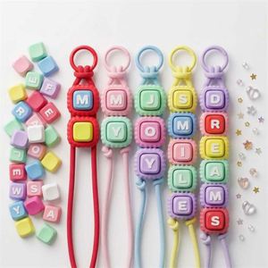Llavero de cubo de letras de dibujos animados populares para aliviar el estrés, diseño de logotipo impreso para colgante de bolso - Product Image 1