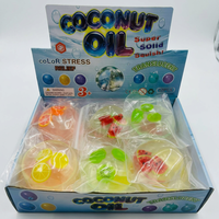 Balle anti-stress sensorielle translucide en forme de tranche de fruit à l'huile de coco, jouet à presser 3+