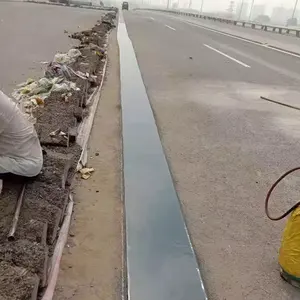 Joint d'expansion de pont sans soudure à bouchon asphaltique