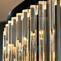 Lampe suspendue circulaire de luxe en cristal avec cadre en fer noir et chaîne réglable pour l'éclairage domestique de la salle à manger