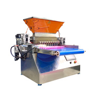 Machine de remplissage semi-automatique de pâte à gâteau et de bonbons gélifiés pour table, idéale pour les boulangeries et ateliers.