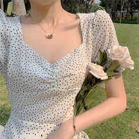 Robe d'été style français vintage amincissante mi-mollet à manches bouffantes à pois