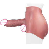 El extensor de pene con una fuerte sensación envolvente cuenta con un pene portátil de silicona mejorado para una experiencia realista