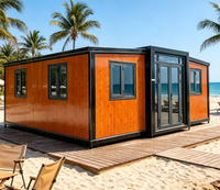 Maison préfabriquée en conteneur, 3 sections, finition bois, cadre noir, villa tropicale en bord de mer, resort palmiers, installation rapide