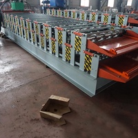 Machine de formage à froid de tôles trapézoïdales à double couche contrôlée par PLC pour panneaux de toiture métalliques, avec pompe, en promotion