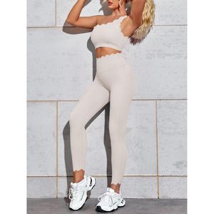 Ensemble d'entraînement Fisoew pour femme, 2 pièces : Leggings taille haute et brassière de sport asymétrique, tenue de gym extensible et active - Product Image 5