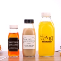 Bouteilles en verre carrées françaises de 16oz et 10oz Couvercle à vis en plastique pour emballage diffusant une surface estampée à chaud