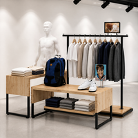 Table de présentation en bois à niveaux avec tringle à vêtements et support de mannequin, pieds en métal noir, fabrication usine