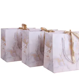 Mini bolsa de papel de Perfume personalizada Biodegradable, regalo de compras de lujo rosa, proveedor Chino, sin mínimo