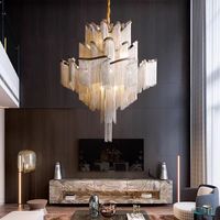 Lustre suspendu en chaîne à franges en aluminium et fer forgé de style moderne et luxueux pour mariage, originalité artistique