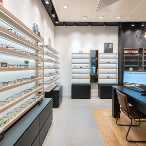 Présentoir à lunettes en bois à grande chaîne personnalisé vitrine de magasin d'optique optimale pour la réception vitrine de table à lunettes - Product Image 1