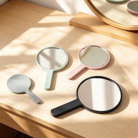 Miroir de maquillage rond haute définition pour femme, cadre en plastique, portable, avec poignée personnalisable, miroir de voyage compact, vente en gros