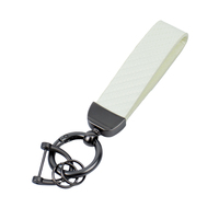 Porte-clés de voiture en cuir personnalisé de luxe, design en fibre de carbone, écologique, rectangulaire, gaufré, de haute qualité, cadeaux d'entreprise