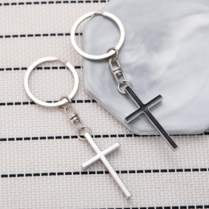 Llavero de moda 2026 con cruz religiosa, colgante decorativo para bolso, amuleto de cruz en blanco y negro - Product Image 1