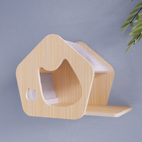 Arbre à chat mural de style mignon avec structure d'escalade, plateforme et cabane en bois massif pour chats, gain de place