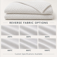 Ensemble de housse de couette gaufrée en coton personnalisable en gros avec envers en coton uni pour hôtels et complexes hôtelie